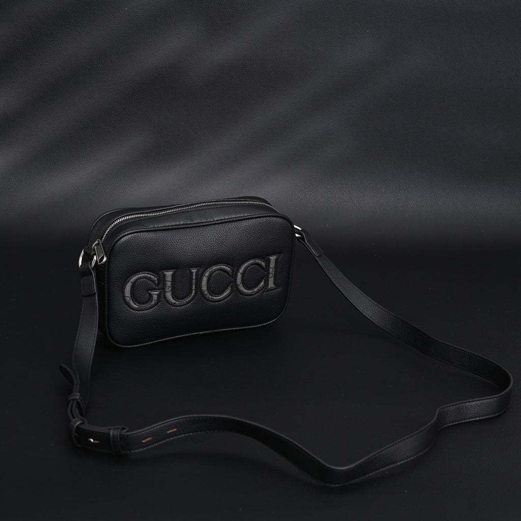 Gucci Black Leather Embossed Logo Belt Bag